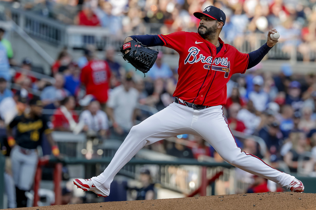 Atlanta Braves pitcher Martin Perez delivers to a Pittsburgh Pirates batter during the second inning of a baseball game, Friday, June 5, 2026, in Atlanta. (AP Photo/Erik S. Lesser)