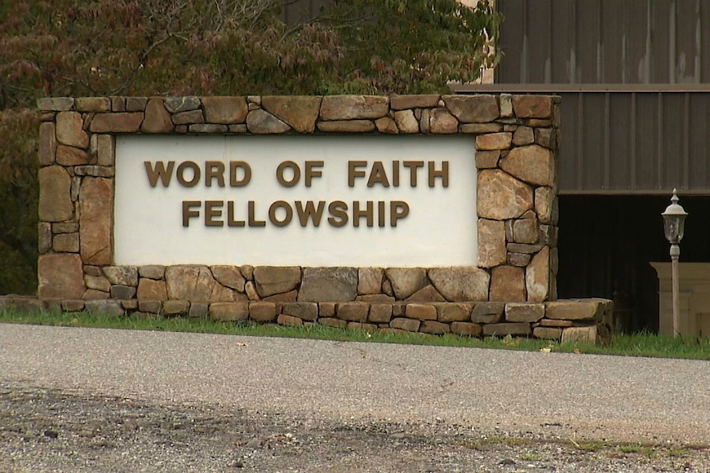 FILE - This 2016 image from video shows the entrance to the Word of Faith Fellowship church in Spindale, N.C. (AP Photo/Alex Sanz, File)