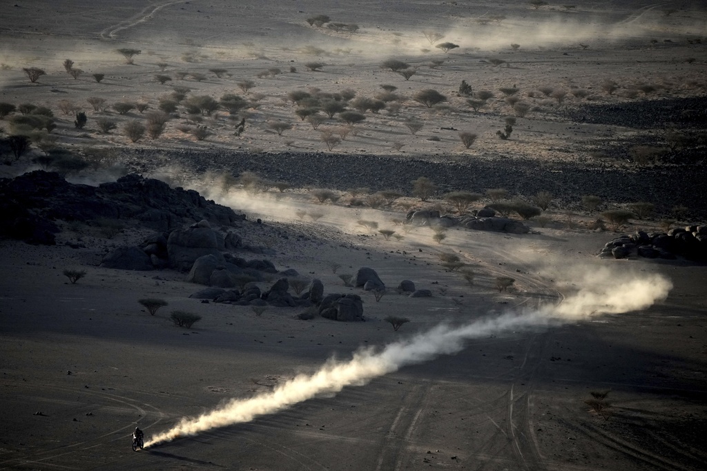 A rider competes during the third stage of the Dakar Rally between Bisha and Al-Henakiyah, Saudi Arabia, Tuesday, Jan. 7, 2025. (AP Photo/Christophe Ena)