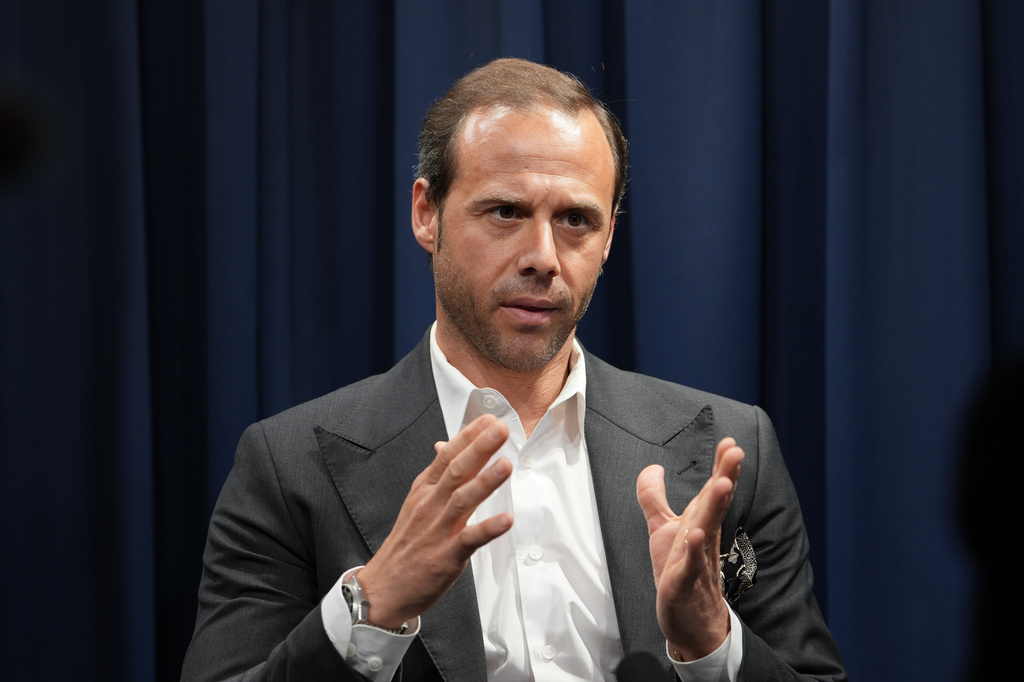 Davide Triacca, Sustainability Director for the Salvatore Ferragamo group, talks with journalist during an interview with Associated Press in Milan, Italy, Wednesday, April 22, 2026. (AP Photo/Antonio Calanni)