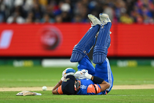 India's Axar Patel fall to the ground after he is run out by Australia during their T20 cricket match in Melbourne, Australia, Friday, Oct. 31, 2025. (James Ross/AAP Image via AP) India's Axar Patel fall to the ground after he is run out by Australia during their T20 cricket match in Melbourne, Australia, Friday, Oct. 31, 2025. (James Ross/AAP Image via AP)