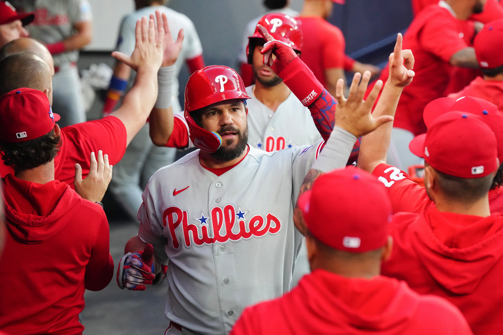 Philadelphia Phillies' Kyle Schwarber celebrates in the dugout after hitting a two-run home run off Toronto Blue Jays pitcher Mason Fluharty during the fourth inning of a baseball game in Toronto on Wednesday June 10, 2026. (Chris Young/The Canadian Press via AP)