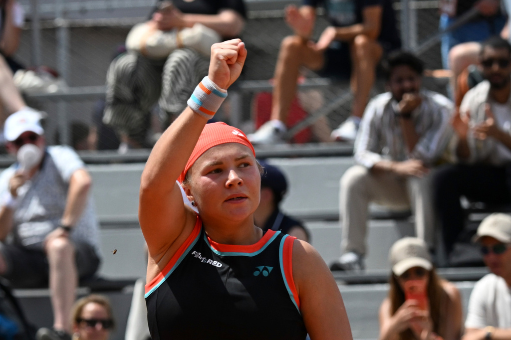 Diana Shnaider of Russia celebrates winning the third round women's singles tennis match against against Oleksandra Oliynykova of Ukraine at the French Open tennis tournament in Paris, Saturday, May 30, 2026. (AP Photo/Emma Da Silva)