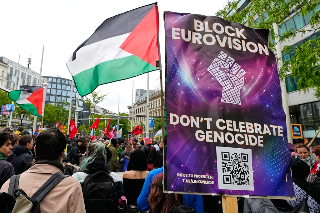 Demonstrators protest against Israel ahead of the Grand Final of the 70th Eurovision Song Contest in Vienna, Austria, Saturday, May 16, 2026. (AP Photo/Martin Meissner)