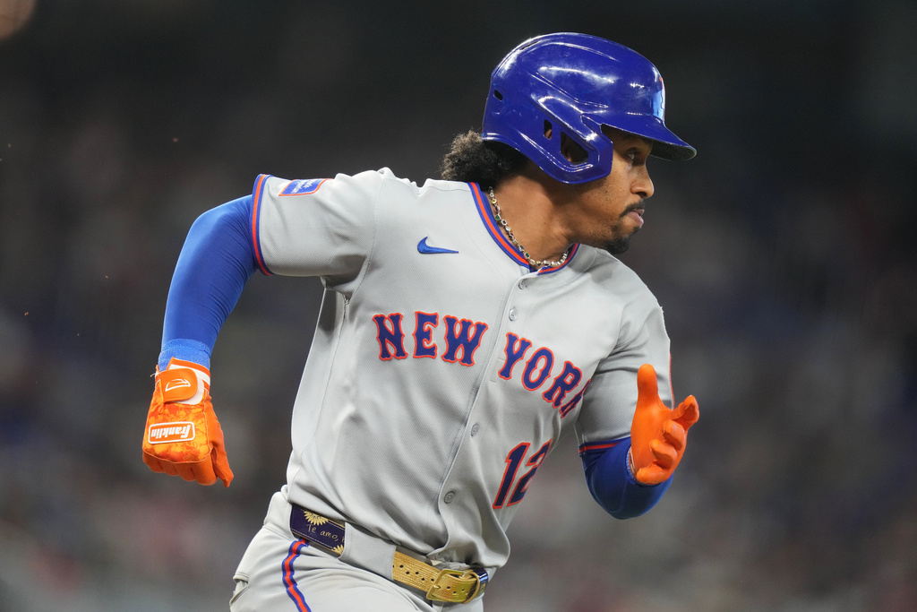 FILE - New York Mets' Francisco Lindor runs after hitting a double during the seventh inning of a baseball game against the Miami Marlins, Sept. 28, 2025, in Miami. (AP Photo/Lynne Sladky, File)