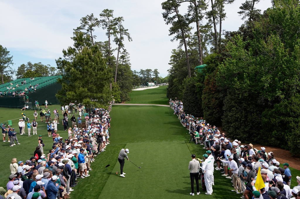 Rory McIlroy, of Northern Ireland, hits his tee shot on the 18th hole during a practice round ahead of the Masters golf tournament at the Augusta National Golf Club, Tuesday, April 7, 2026, in Augusta, Ga. (AP Photo/David J. Phillip)