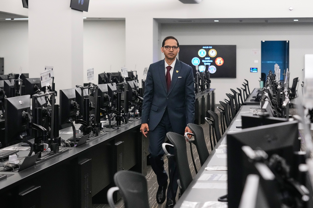 FBI Special Agent in Charge Amit Kachhia-Patel, Mission Services Division, walks through a portion of the agency's Joint Operations Center in New York, Thursday, June 4, 2026, ahead of the World Cup soccer tournament. (AP Photo/Richard Drew)