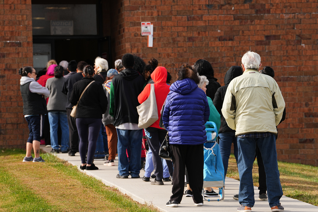 People wait in line durning an emergency food distribution at The Jewish Federation of Greater Philadelphia's Mitzvah Food Program in Philadelphia, Friday, Nov. 7, 2025. (AP Photo/Matt Rourke)