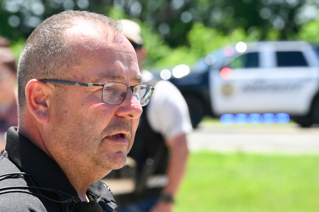 Bates County Sheriff Chad Anderson speaks at a press conference about the plane crash at Butler Memorial Airport, in Butler, Mo., Sunday, June 14, 2026. (AP Photo/Reed Hoffmann)