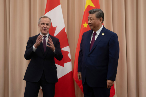 Canadian Prime Minister Mark Carney, left, meets Chinese President Xi Jinping at the start of a meeting in Gyeongju, South Korea, Friday, Oct. 31, 2025. (Adrian Wyld/The Canadian Press via AP) Canadian Prime Minister Mark Carney, left, meets Chinese President Xi Jinping at the start of a meeting in Gyeongju, South Korea, Friday, Oct. 31, 2025. (Adrian Wyld/The Canadian Press via AP)