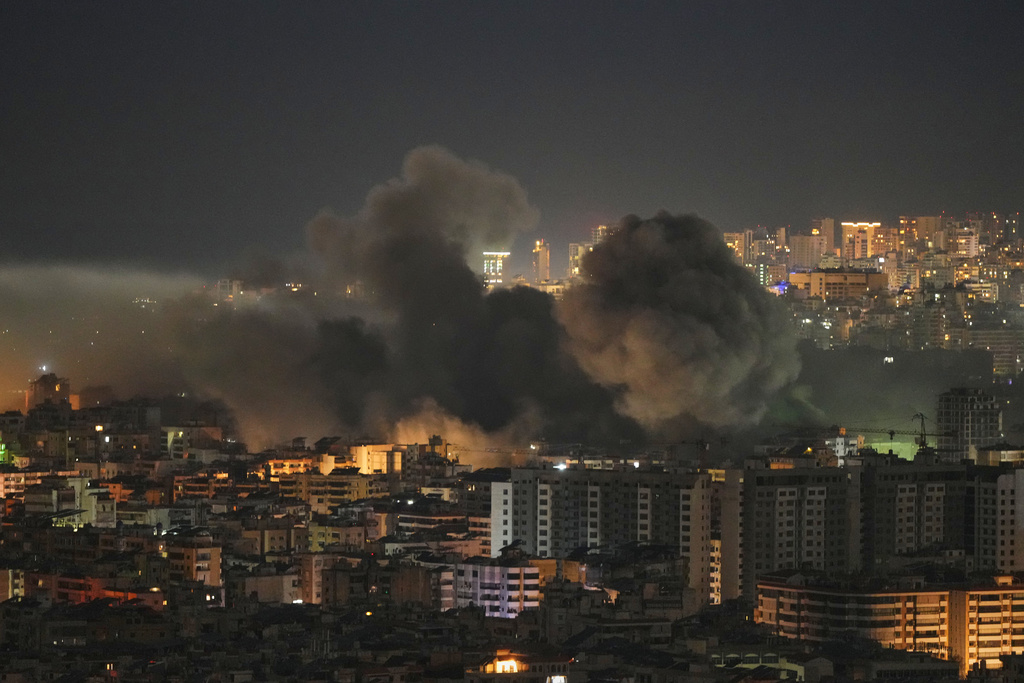 Smoke rises following an Israeli airstrike in the Dahiyeh area of Beirut, Thursday, March 5, 2026. (AP Photo/Hassan Ammar)