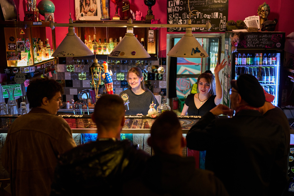AKS Zly Praga soccer team fans gather at the Offside bar, in Praga district in Warsaw, Poland, Friday, April 24, 2026. (AP Photo/Ebrahim Noroozi)