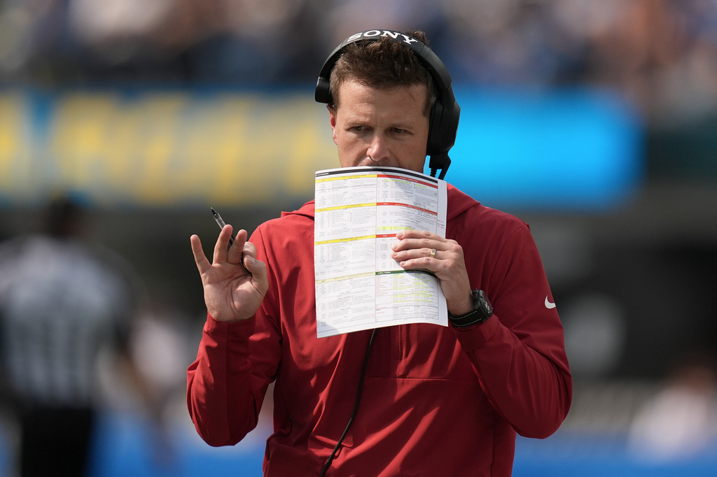 Arizona Cardinals head coach Mike LaFleur walks on the sideline during the second half of an NFL football game against the Los Angeles Chargers, Sunday, Sept. 13, 2026, in Inglewood, Calif. (AP Photo/Gregory Bull)