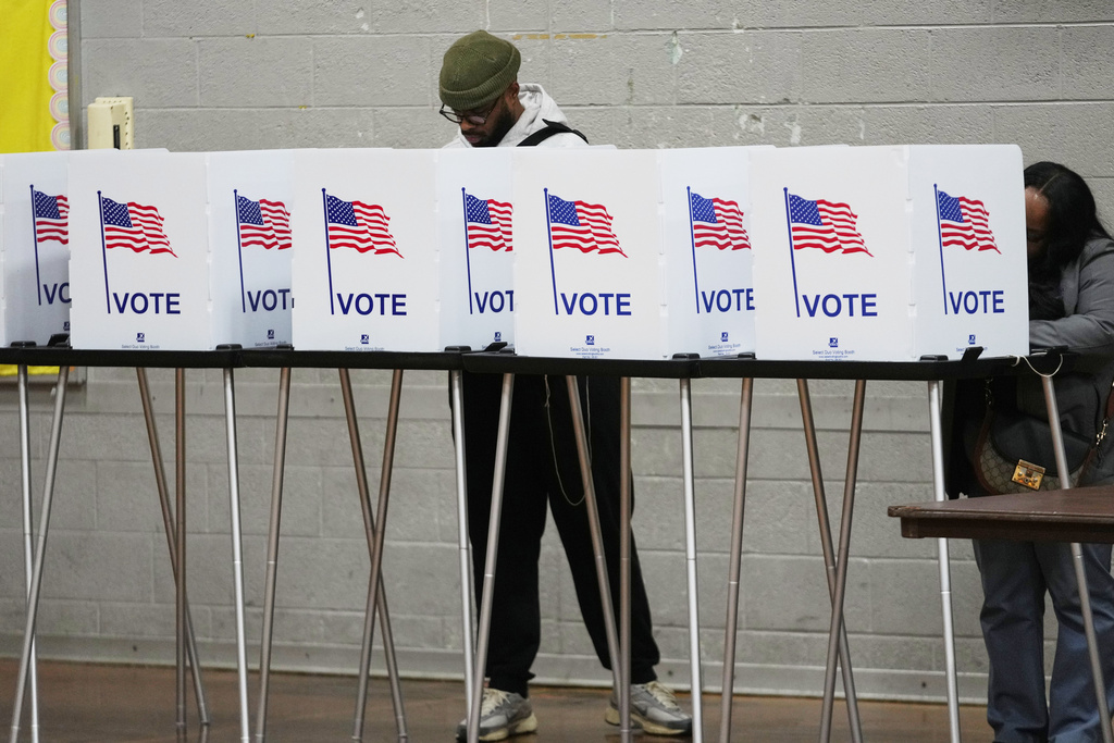 FILE - Voters fill out their ballots Nov. 4, 2025, in Detroit. (AP Photo/Paul Sancya, File)