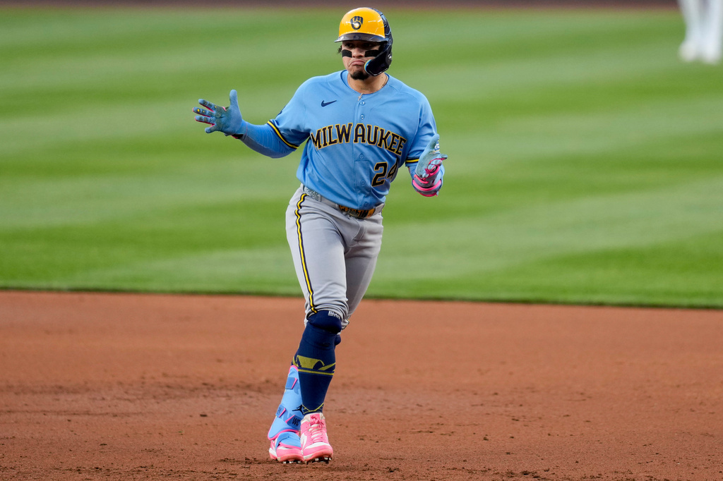 Milwaukee Brewers' William Contreras celebrates after his RBI single against the Washington Nationals during the third inning of a baseball game, Friday, May 1, 2026, in Washington. (AP Photo/Jess Rapfogel)