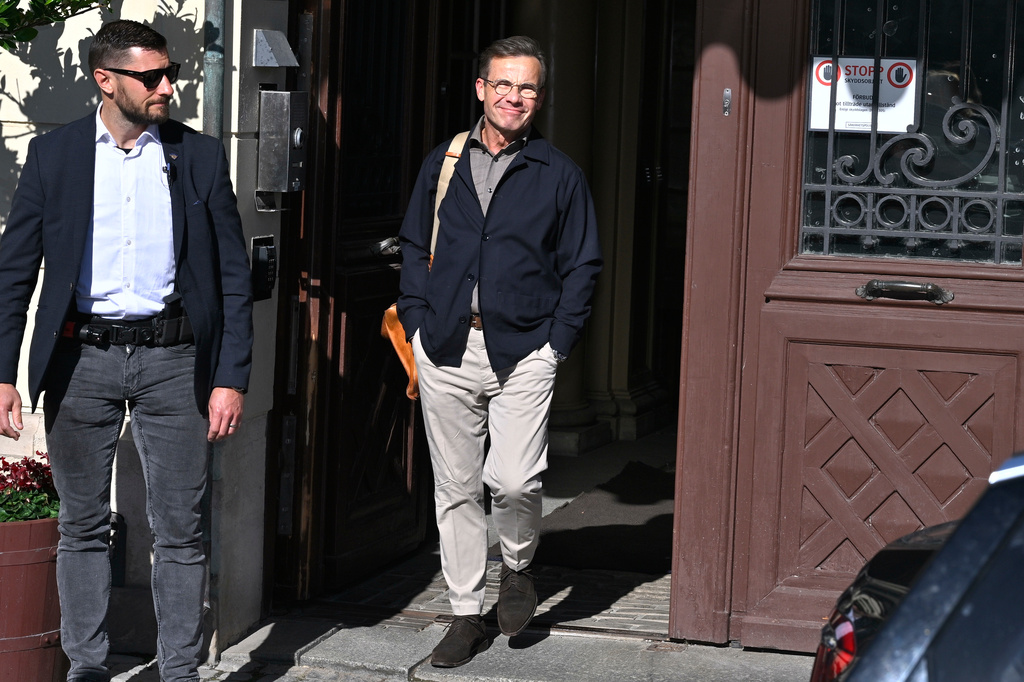 Swedish Prime Minister Ulf Kristersson leaves the official residence, Sager House, in Stockholm, a day after the vote in a general election, Monday, Sept. 14, 2026. (Claudio Bresciani/TT News Agency via AP)