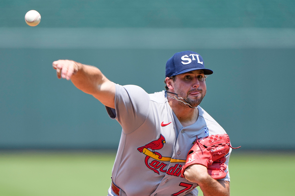 St. Louis Cardinals pitcher Max Rajcic throws during the third inning of a baseball game against the Kansas City Royals, Sunday, June 21, 2026, in Kansas City, Mo. (AP Photo/Charlie Riedel)