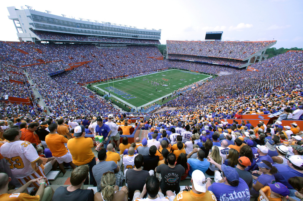 FILE - In this Sept. 17, 2011, file photo, fans watch an NCAA college football game between Tennessee and Florida at Florida Field (aka The Swamp) in Gainesville, Fla. (AP Photo/Phelan M. Ebenhack, File)