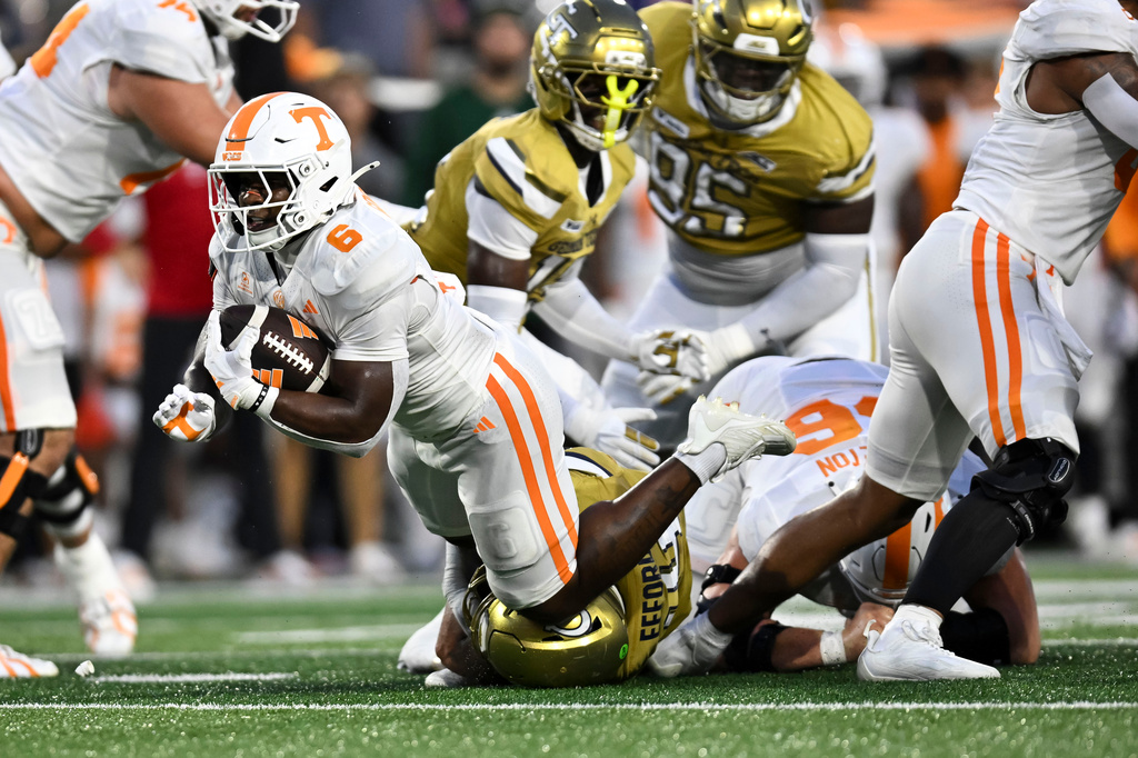 Tennessee Volunteers running back Javin Gordon (6) gains yardage against the Georgia Tech during the first half of an NCAA college football game against, Saturday, Sept. 12, 2026, in Atlanta. (AP Photo/Daniel Varnado)