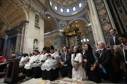 Faithful pray as Cardinal Raymond Leo Burke celebrates an old Latin Mass for pilgrims in St. Peter's Basilica, at the Vatican, Saturday, Oct. 25, 2025. (AP Photo/Alessandra Tarantino) Faithful pray as Cardinal Raymond Leo Burke celebrates an old Latin Mass for pilgrims in St. Peter's Basilica, at the Vatican, Saturday, Oct. 25, 2025. (AP Photo/Alessandra Tarantino)