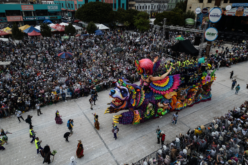 Revelers partake in the Black and White Carnival, recognized by UNESCO as Intangible Cultural Heritage, in Pasto, Colombia, Tuesday, Jan. 6, 2026. (AP Photo/Ivan Valencia)