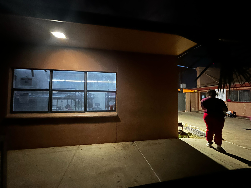 Immigrant families settle in for the night at the Holding Institute in Laredo, Texas, on Feb. 12, 2026. (AP Photo/Valerie Gonzalez)