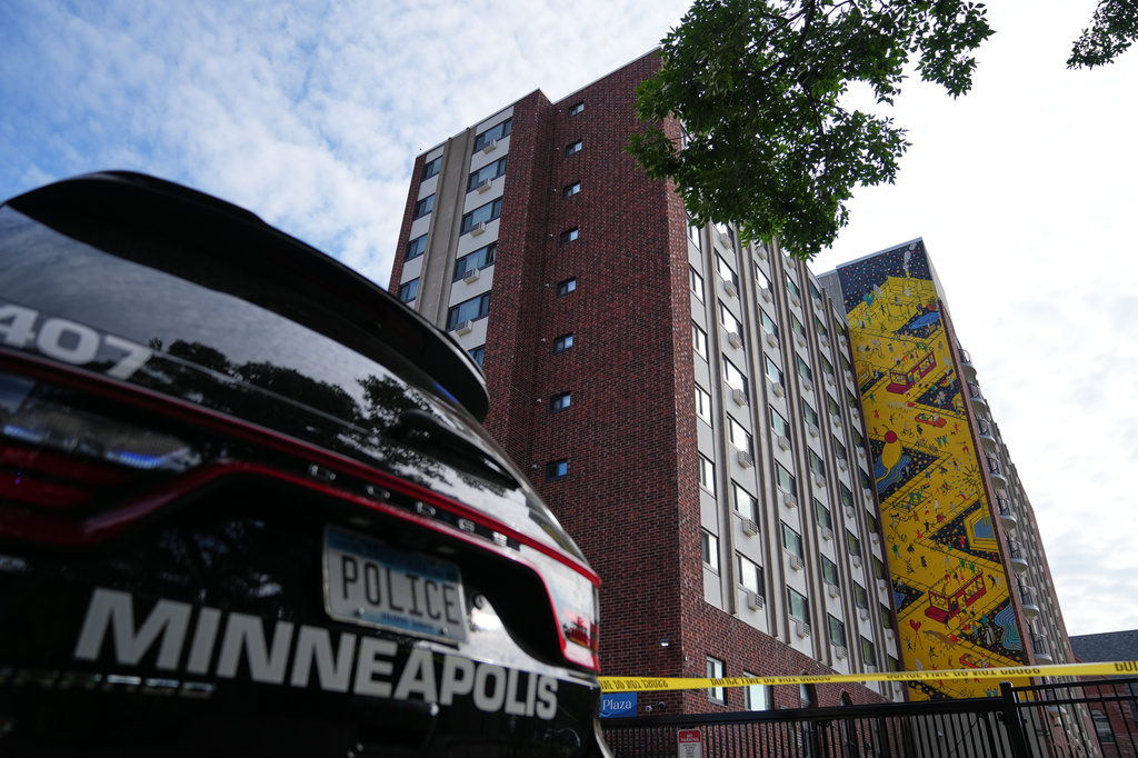 Police continue to investigate the scene of a Wednesday shooting at Shoreline Plaza apartments, Thursday, Sept. 3, 2026, in Minneapolis. (AP Photo/Ellen Schmidt) CORRECTION: Shoreline, not Shoreview