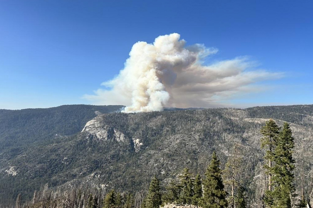 This photo provided by the National Parks Service shows the Dome Fire burning in Yosemite National Park on Wednesday, Sept. 16, 2026. (National Parks Service via AP)