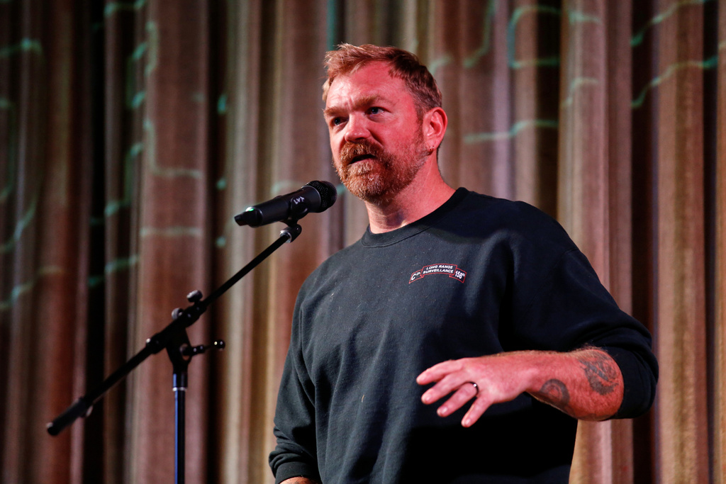 FILE - Democratic Maine Senate candidate Graham Platner speaks at a town hall in Ogunquit, Maine, Oct. 22, 2025. (AP Photo/Caleb Jones, File)
