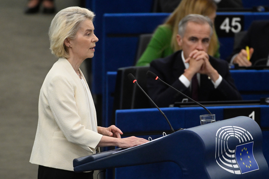 Canada's Prime Minister Mark Carney, right, listens to European Commission President Ursula von der Leyen, during the annual State of the European Union at the European Parliament in Strasbourg, eastern France, Wednesday, Sept 16, 2026. (AP Photo/Pascal Bastien)
