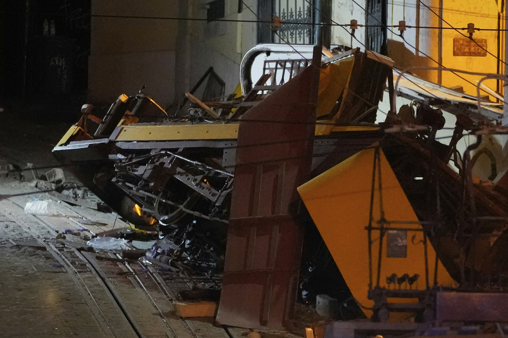 View of the site of a derailed electric streetcar in Lisbon, Portugal, Wednesday, Sept. 3, 2025. (AP Photo/Armando Franca)