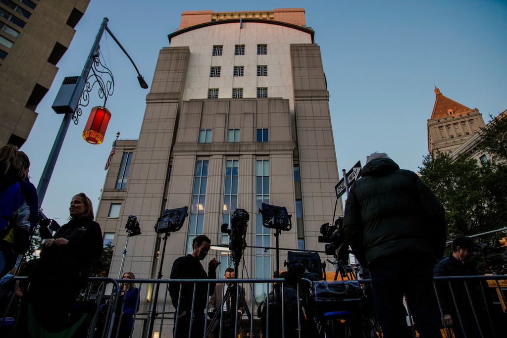 Media waits outside the Manhattan federal court for the sentencing of Sean "Diddy" Combs in New York, Friday, Oct. 3, 2025. (AP Photo/Eduardo Munoz Alvarez)