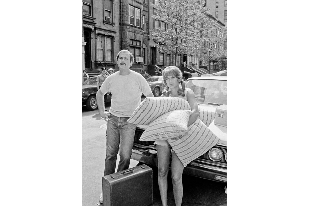 FILE - Actor Rob Reiner and his wife, Penny Marshall, waiting to begin a scene for the film "Love Me and I'll Be Your Best Friend," filming on New York's 84th Street, June 20, 1978. (AP Photo/Dan Grossi, File)