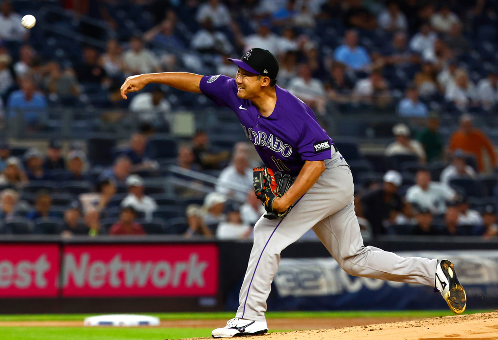 Colorado Rockies' Tomoyuki Sugano throws against the New York Yankees during the first inning of a baseball game, Wednesday, Sept. 9, 2026, in New York. (AP Photo/Noah K. Murray)