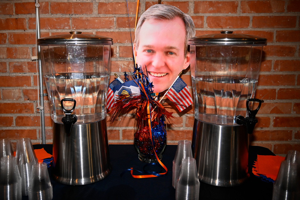 A paper head of democratic congressional candidate Ben McAdams sits out during a watch party for Utah's primary election on Tuesday, June 23, 2026, in Salt Lake City. (AP Photo/Alex Goodlett)