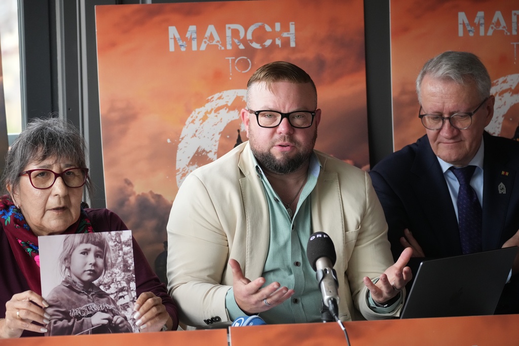Evelyn Korkmaz, left, Gemma Hickey, center, and Matthias Katsch, with Ending Clergy Abuse, a global organization of abuse victims and activists, hold a press conference after a meeting with Pope Leo XIV at the Vatican, in Rome, Monday, Oct. 20, 2025. (AP Photo/Andrew Medichini)