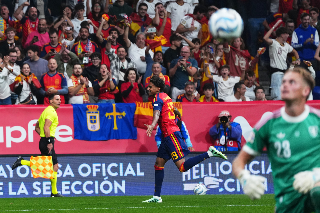 Spain's Lamine Yamal runs to celebrate after scoring his sides first goal during the UEFA Nations League soccer match between Spain and Czechia in Oviedo, Spain, Saturday, Oct. 3, 2026. (AP Photo/Manu Fernandez)