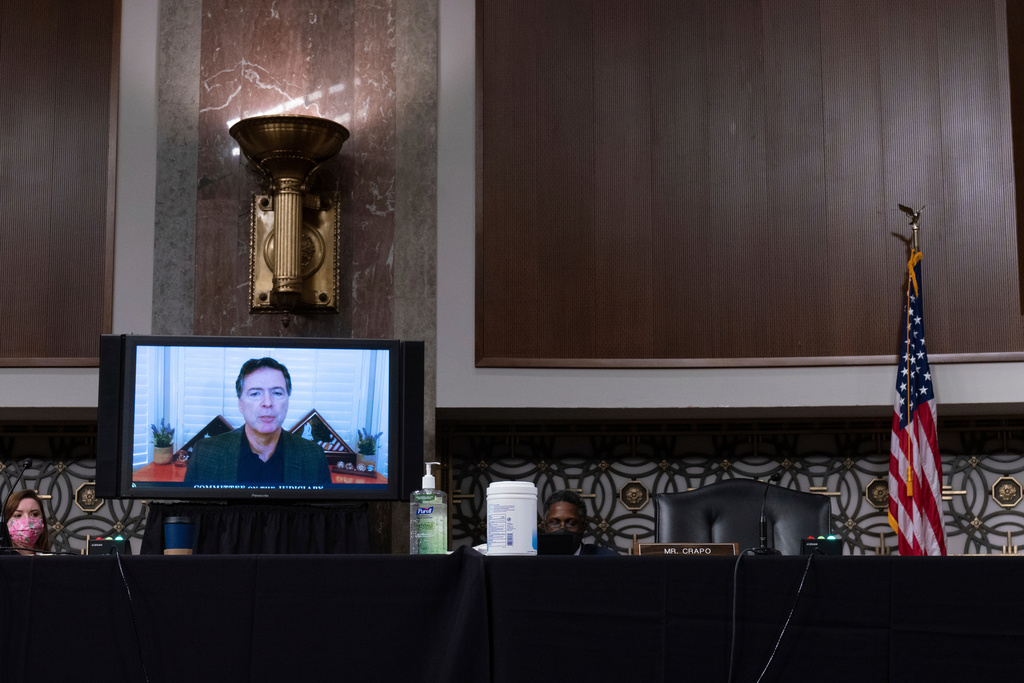 FILE - Former FBI director James Comey testifies via videoconference during a Senate Judiciary Committee hearing on Capitol Hill in Washington, Wednesday, Sept. 30, 2020, to examine the FBI "Crossfire Hurricane" investigation. (Ken Cedeno/Pool via AP, File)