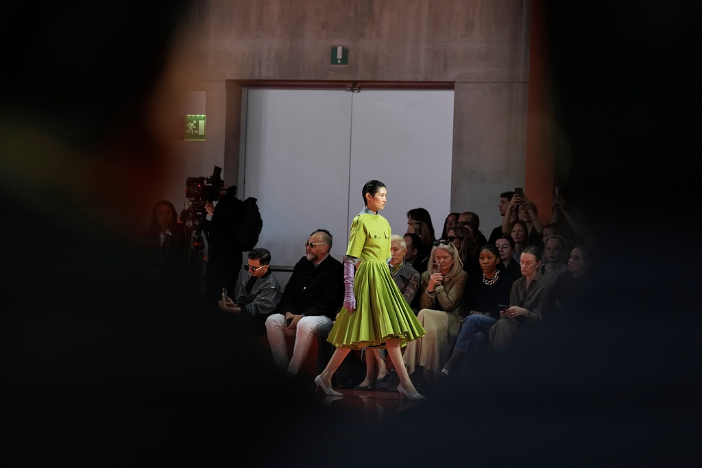 A model wears a creation as part of the Prada Spring/Summer 2026 collection presented in Milan, Italy, Thursday, Sept. 25, 2025. (AP Photo/Luca Bruno)