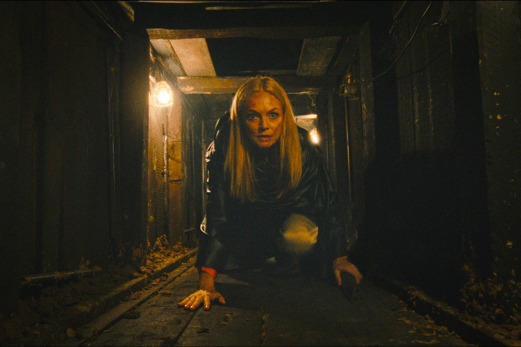 This image released by Warner Bros. Pictures shows Heather Graham in a scene from "They Will Kill You." (Warner Bros. Pictures via AP)