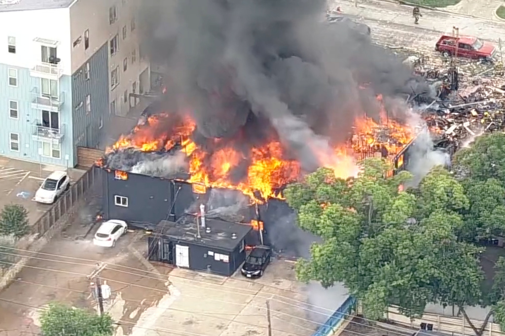 This image made from video provided by KDFW FOX 4 shows a large fire at an apartment complex in Dallas, Thursday, May 28, 2026. (KDFW FOX 4 via AP)