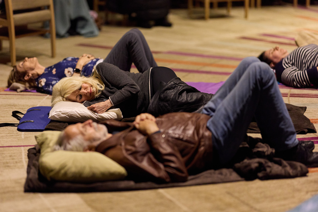 People partake in a sound bath at Temple Emanuel, Saturday, Dec. 6, 2025, in Beverly Hills, Calif. (AP Photo/Allison Dinner)