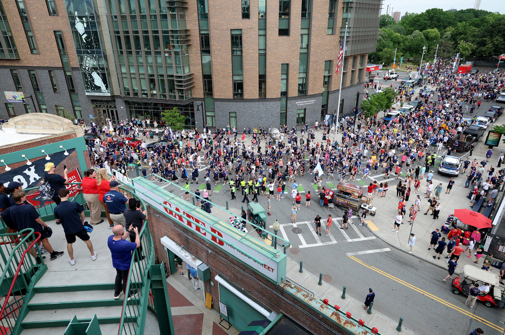Scotland soccer fans take part in the Tartan Army March, making their way to Fenway Park ahead of a baseball game between the Boston Red Sox and the Texas Rangers, Sunday, June 14, 2026, in Boston. (AP Photo/Mark Stockwell)