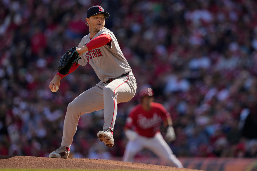 Boston Red Sox pitcher Sonny Gray throws during the first inning of a baseball game against the Cincinnati Reds and the Boston Red Sox in Cincinnati, Saturday, March 28, 2026. (AP Photo/Carolyn Kaster)