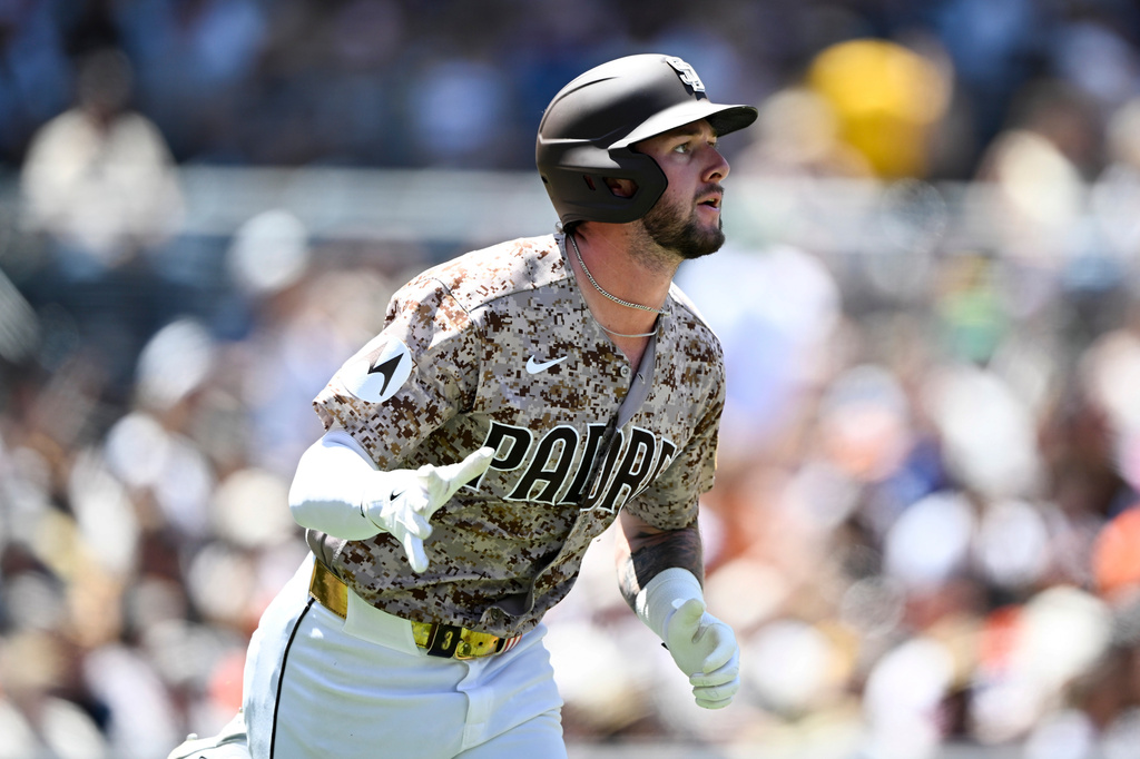 San Diego Padres' Jackson Merrill rounds the bases after hitting a two-run home run during the second inning of a baseball game against the San Francisco Giants Sunday, Aug. 2, 2026, in San Diego. (AP Photo/Denis Poroy)
