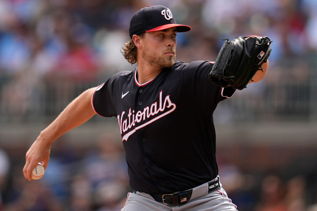 Washington Nationals pitcher Jake Irvin works in the first inning of a baseball game against the Atlanta Braves, Saturday, May 23, 2026, in Atlanta. (AP Photo/Mike Stewart)