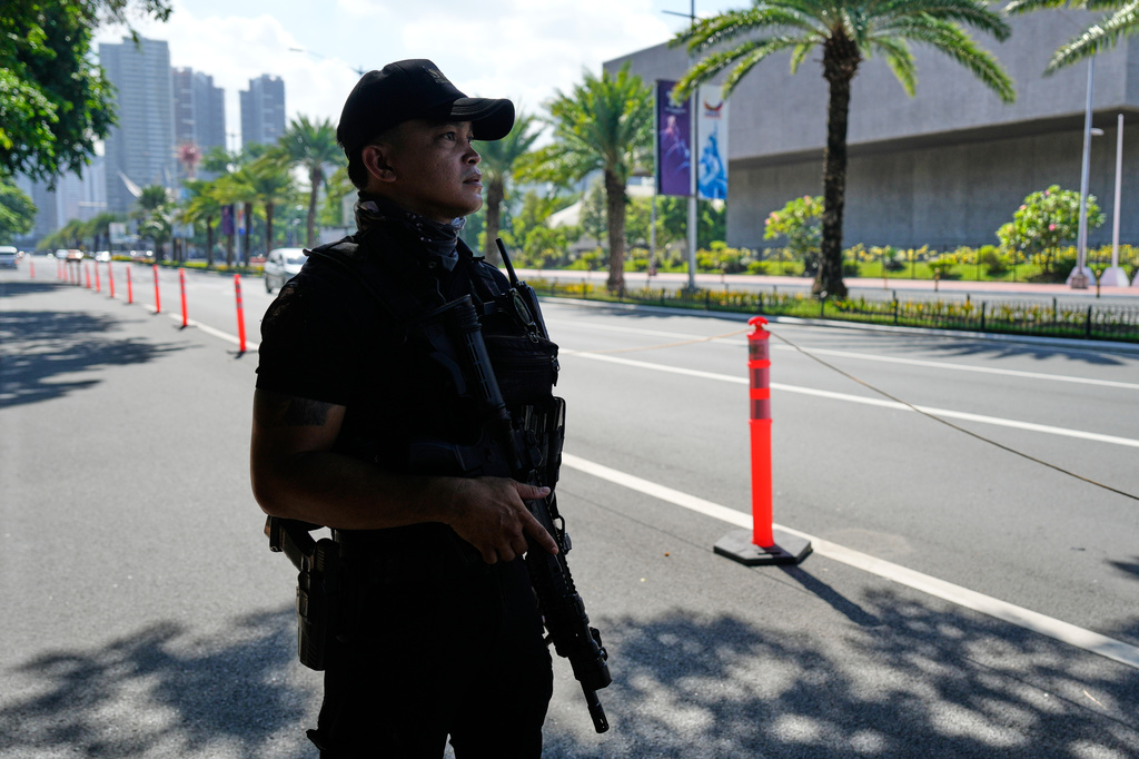 Police patrol outside the venue of the 59th ASEAN Foreign Ministers' Meeting, Post-Ministerial Conferences, and the 50th Anniversary of the Treaty of Amity and Cooperation in Southeast Asia on Monday, July 20, 2026, in Manila, Philippines. (AP Photo/Aaron Favila)