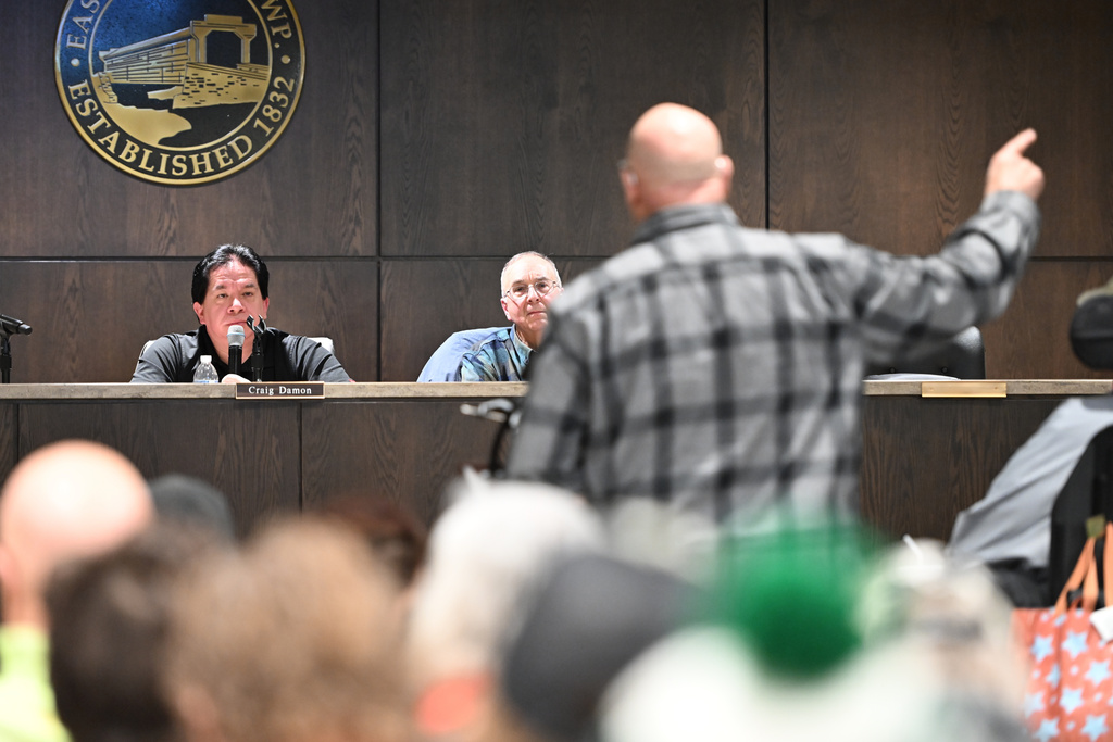 Mike Petak of Spring City gestures while speaking to East Vincent Township supervisors in opposition to a data center proposal at the former Pennhurst state hospital grounds, Dec. 17, 2025, in Spring City, Pa. (AP Photo/Marc Levy)