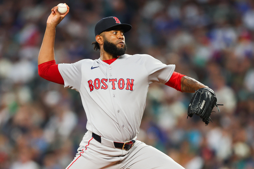 Boston Red Sox pitcher Tayron Guerrero delivers during the seventh inning of a baseball game against the Seattle Mariners, Saturday, June 20, 2026, in Seattle. (AP Photo/Kevin Ng)