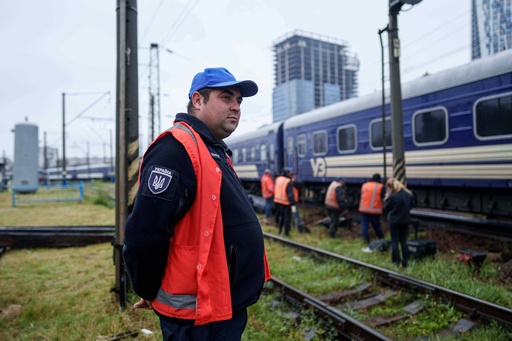 Shevcuk Maksym, 30, a railway repair team leader, looks at railway track repair work in Kyiv, Ukraine, Thursday, Oct. 2, 2025. (AP Photo/Evgeniy Maloletka) Shevcuk Maksym, 30, a railway repair team leader, looks at railway track repair work in Kyiv, Ukraine, Thursday, Oct. 2, 2025. (AP Photo/Evgeniy Maloletka)